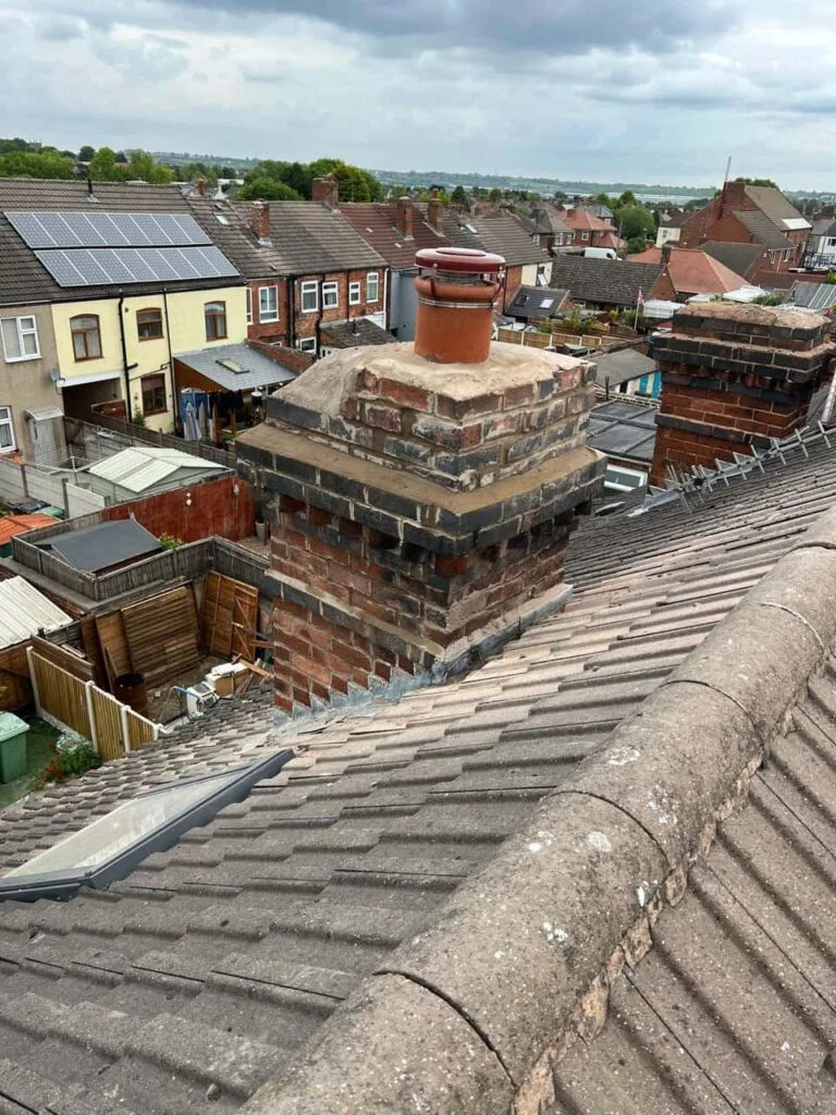 This is a photo taken from a roof which is being repaired by Petersfield Roofing Repairs, it shows a street of houses, and their roofs